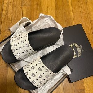 Used once MCM slides with box nd dust bag